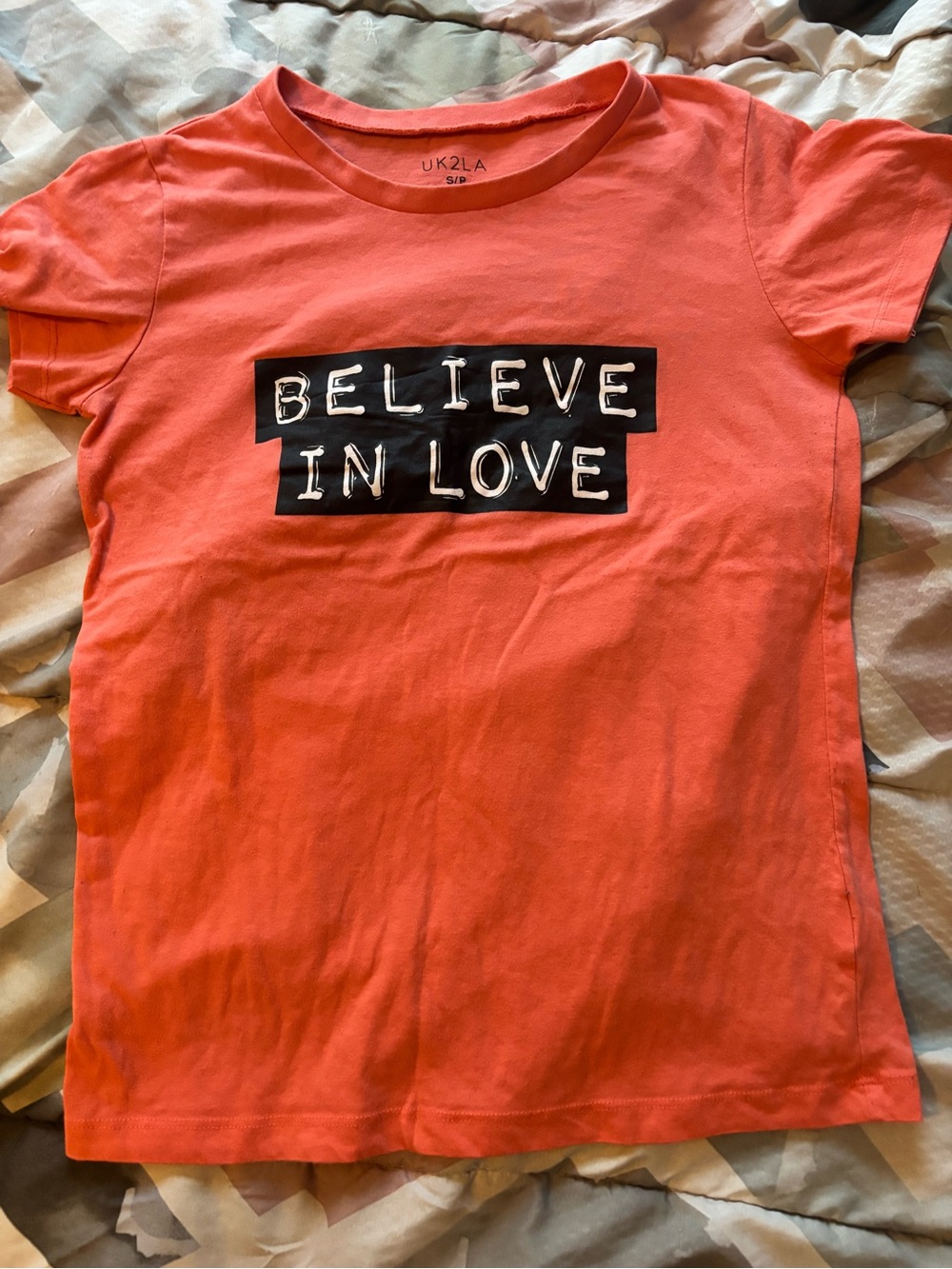 UK2LA Coral Tee with Black 'Believe In Love' Graphic